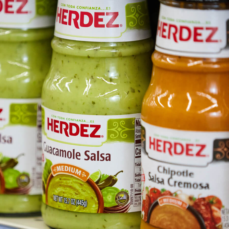 Herdez Guacamole Salsa on grocery store shelf